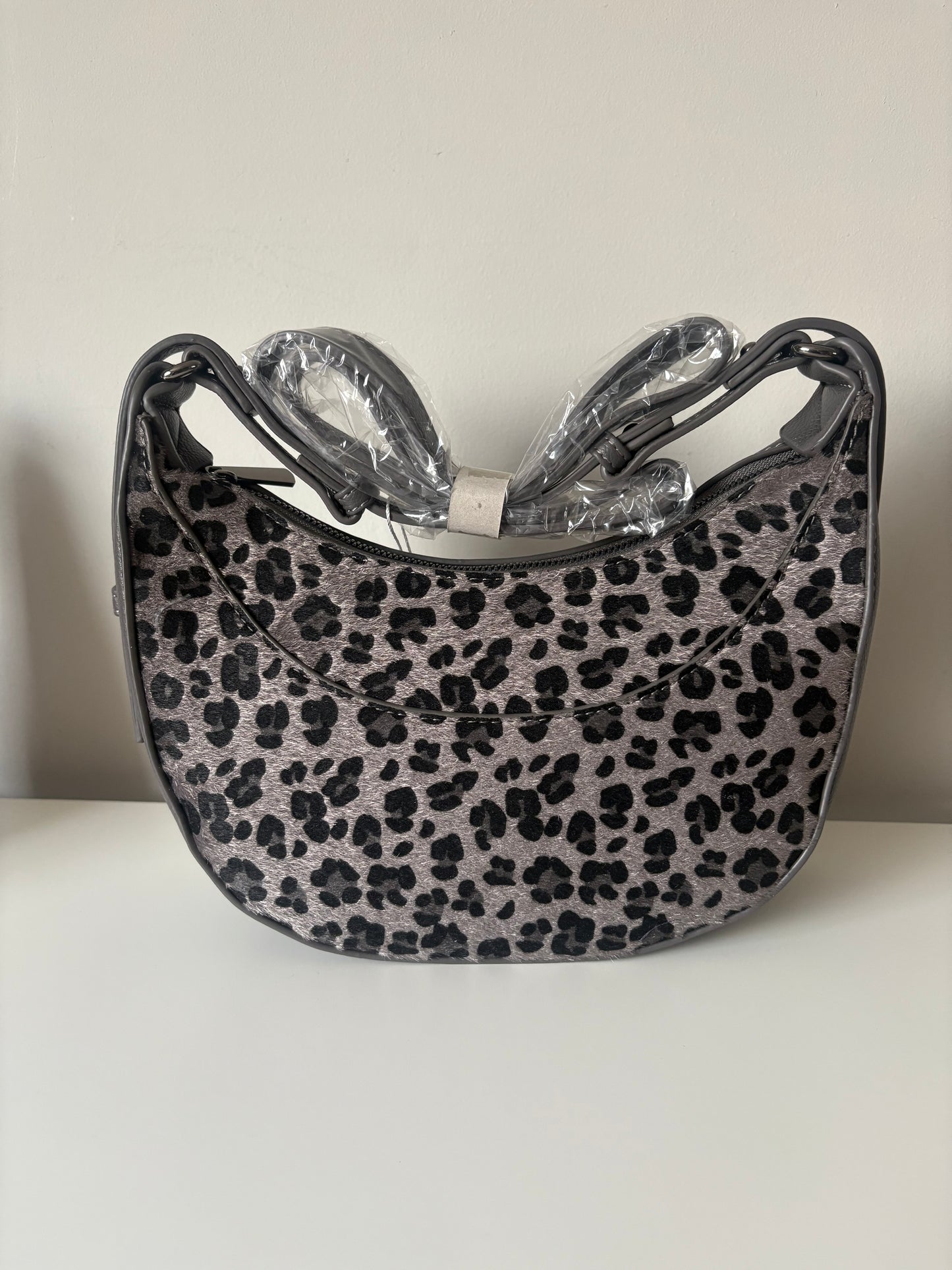 Rounded Animal Print Crossbody Bag