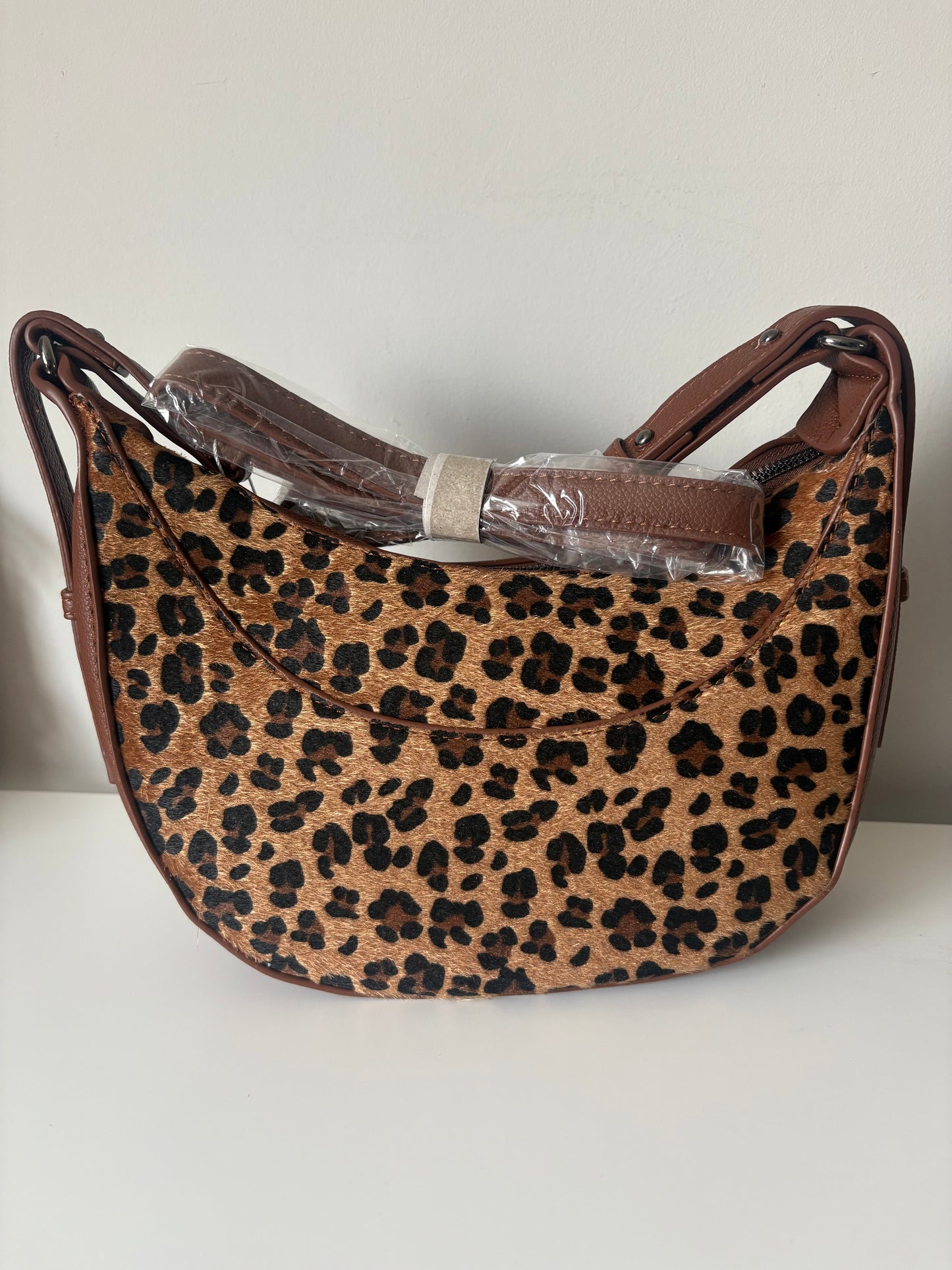 Rounded Animal Print Crossbody Bag